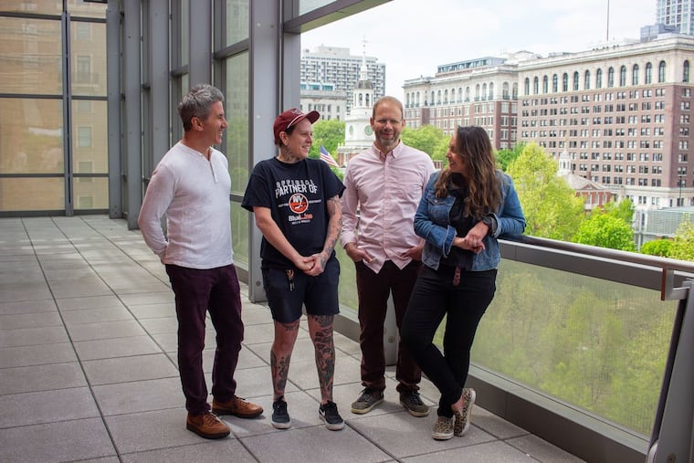 From left: Mike Solomonov with culinary director Caitlin McMillan, business partner Steve Cook, and director of events Neira Jackson at the Weitzman, overlooking Independence Mall.