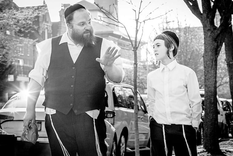 "Menashe": Menashe Lustig (left) and Ruben Niborski portry themselves in the story of a grocery store clerk trying to maintain custody of his son after his wife dies.