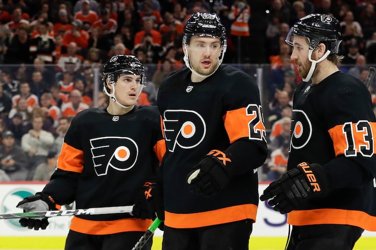 The Flyers will be returning to the ice soon after the NHL announced its 24-team return to play plan on Tuesday. Forward James van Riemsdyk (center) was the Flyers' NHLPA representative during negotiations with the league over the format.
