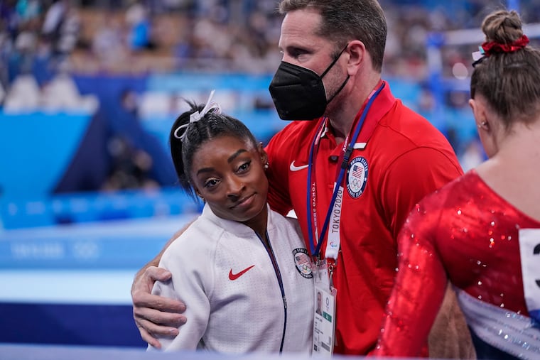 Simone Biles, left, will compete in the balance beam finals on Tuesday, a little over a week after stepping away from the meet to focus on her mental health.