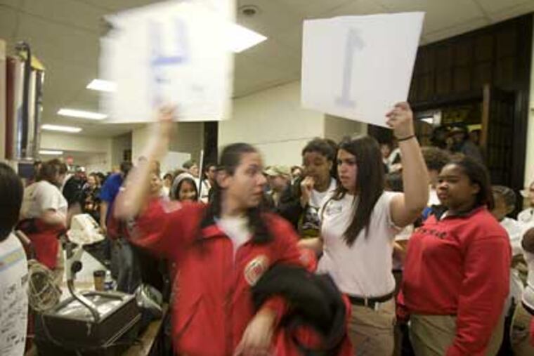 On the Rev. Dr. Martin Luther King Jr. Day of Service, City Year volunteers participated in community service with students at Kensington International School of Business and CAPA High School. (Ed Hille / Staff Photographer)
