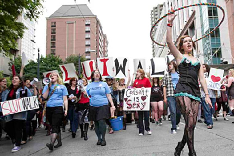 Women took part in Seattle's SlutWalk June 19. The first march was in Toronto. Philadelphia's is scheduled for Aug. 6. (Joe Dyer/Associated Press)