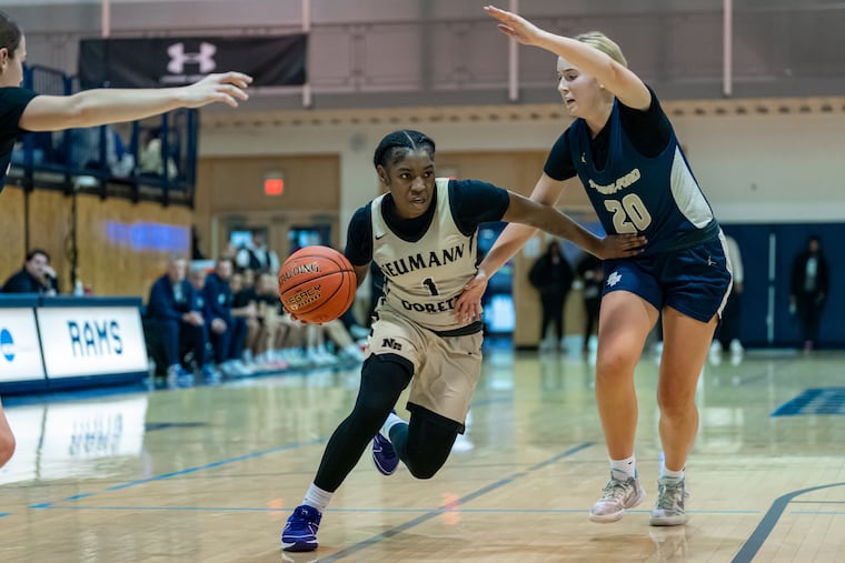 Neumann Goretti’s Carry Easley drives on Spring-Ford’s Siena Miller during the CoBL Winter Classic at Jefferson University on Dec. 17.