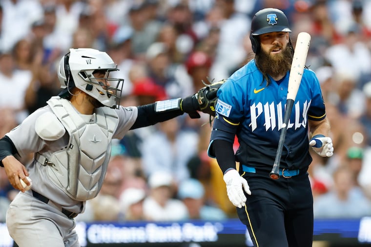Brandon Marsh flips his bat after striking out swinging to end the fourth inning in an eventual 1-0 loss to the Yankees.