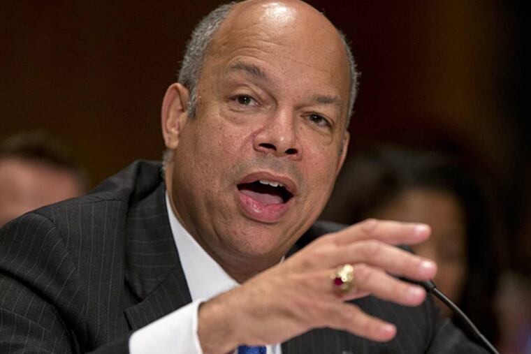 FILE - In this Nov. 13, 2013 file photo, Homeland Security Secretary nominee Jeh Johnson testifies on Capitol Hill in Washington before the Senate Homeland Security and Governmental Affairs Committee hearing on his nomination. Democrats begin a drive this week to muscle a half dozen of President Barrack Obama's Republican-opposed nominees through the Senate after clamping shackles on traditional minority party rights in last month's power play against the GOP. Republicans, however, still have some tools for grinding the Senate's work to an excruciatingly slow crawl. (AP Photo/Carolyn Kaster, File)