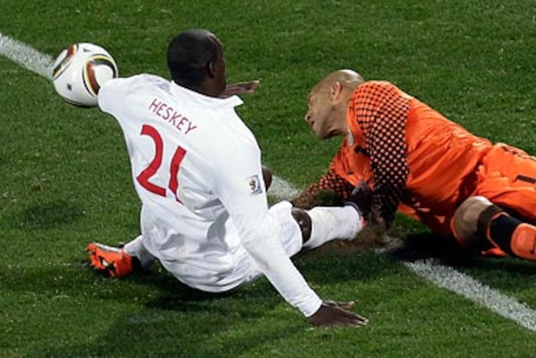 U.S. coach Bob Bradley is optimistic that Tim Howard will be able to play again in the World Cup. (Michael Sohn/AP)