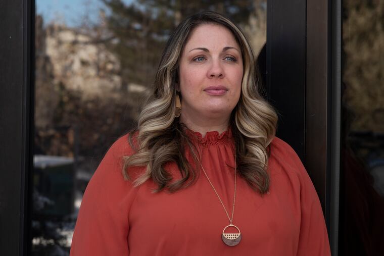 Lorie Smith, owner of 303 Creative, poses at her studio in Littleton, Colo., on Nov. 15, 2022.