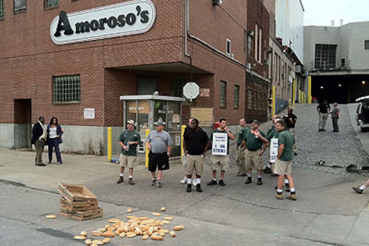 Striking unionized drivers picketed Amoroso's bakery, near South 55th Street and Baltimore Avenue in West Philadelphia, on Monday morning. Drivers will be back at work tonight, Teamsters Local 463 President Bob Ryder said. (Clem Murray / Staff Photographer)