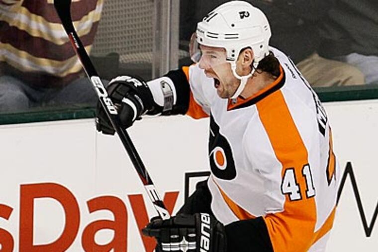 Andrej Meszaros and the Flyers own a league-best 13-3-2 record on the road. (Brandon Wade/AP)