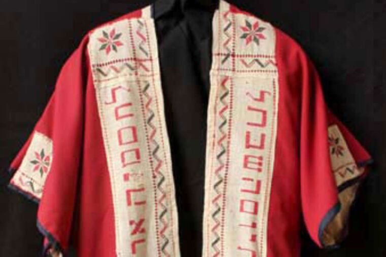 The sacred garment Marlene Adler created from a 1911 cloth bearing a Hebrew blessing.
