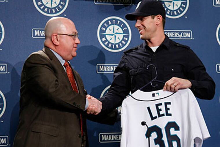 Cliff Lee had surgery Friday to remove a floating spur in his left foot. (John Froschauer/AP)