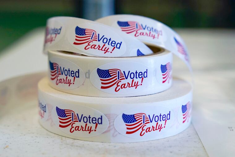 Rolls of "I Voted Early" stickers awaited voters in the final hours of early voting in the primary election in Noblesville, Ind., on May 2, 2022.