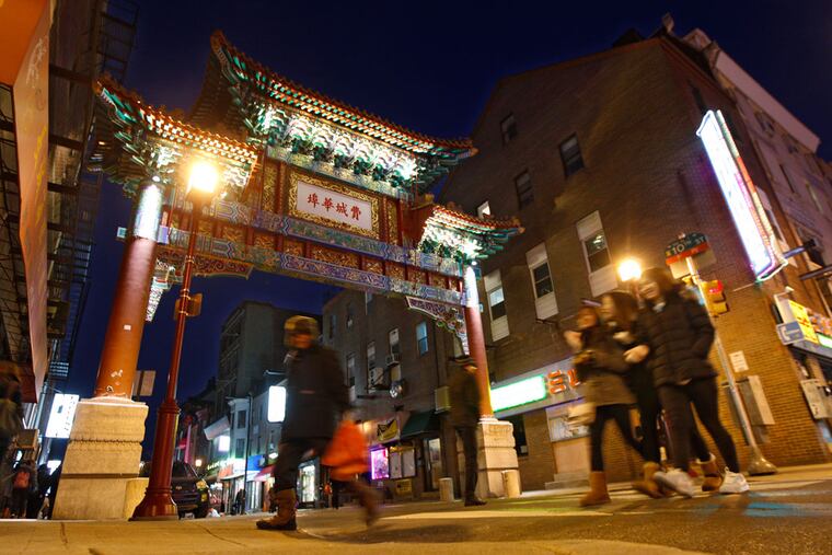 The Chinese Friendship Gate is the focal point of Chinatown where new restaurants are changing the look of the venerable Chinese community. ( MICHAEL BRYANT / Staff Photographer )