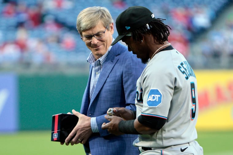 Phillies managing parter John Middleton walks with Jean Segura after the former Phillie received his National League championship ring before the game on Monday.