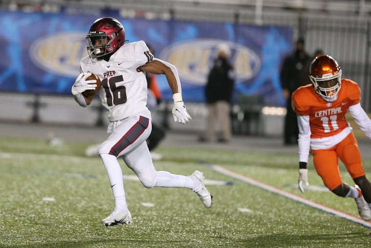 Malik Cooper of St. Joseph’s Prep heads past Taylor Wright-Rawls of Central York on his way to a 79-yard touchdown reception.