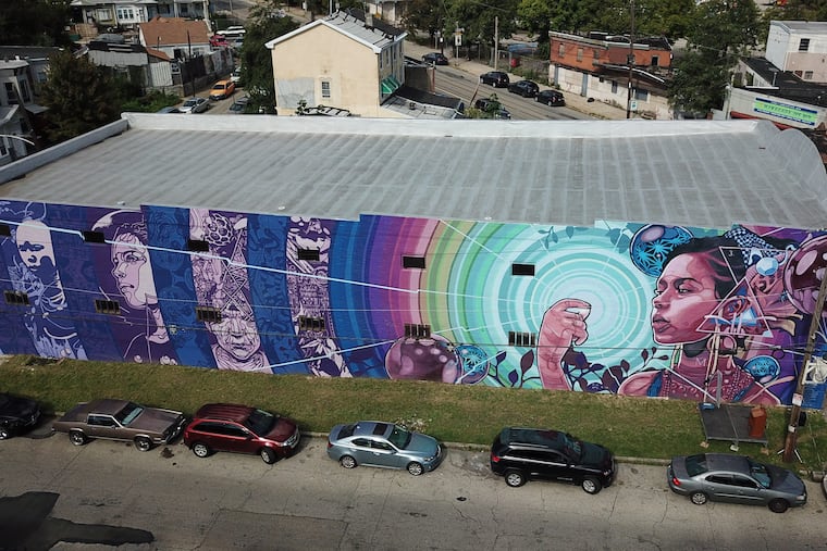 Mural Arts Philadelphia unveils Dreams, Diaspora, and Destiny, a new augmented reality mural that involved students from Haverford School and Mastery Shoemaker Charter School at 53rd and Media Streets.