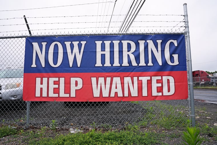 A help wanted sign is posted in Morrisville, Pa. in June 2025.