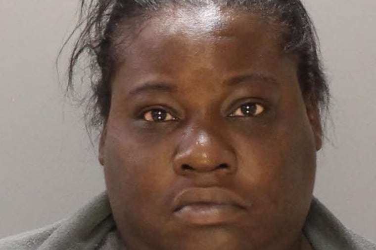 Angela Hall has been charged with running over a Philadelphia police officer with her car during looting related to the death of George Floyd