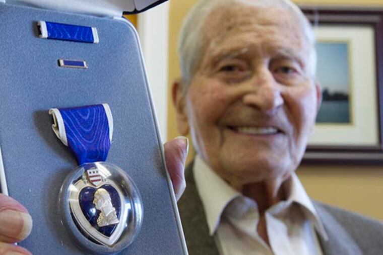 Leonard Rotsky receives his WWII Purple Heart at U.S. Rep. Christopher Smith's Ocean County office, October 16, 2014. ( DAVID M WARREN / Staff Photographer )