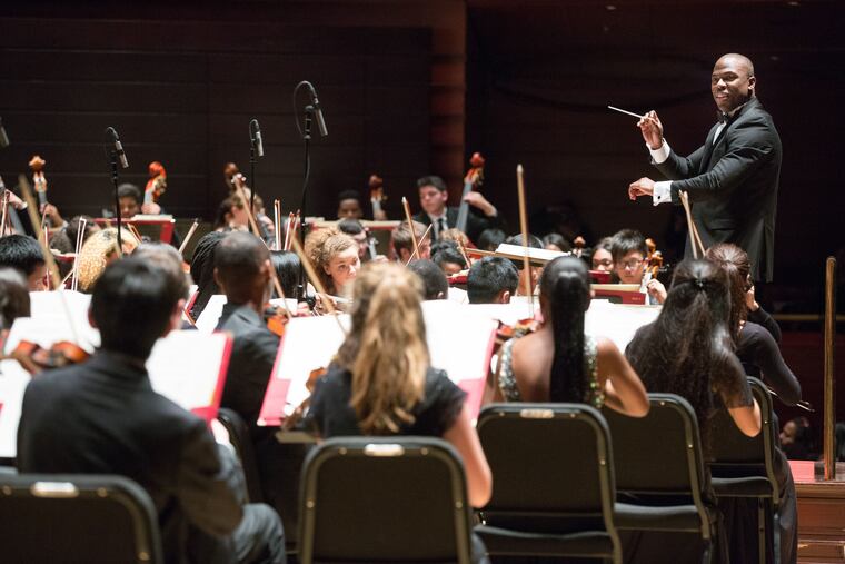 Joseph Conyers conducting the All City Orchestra