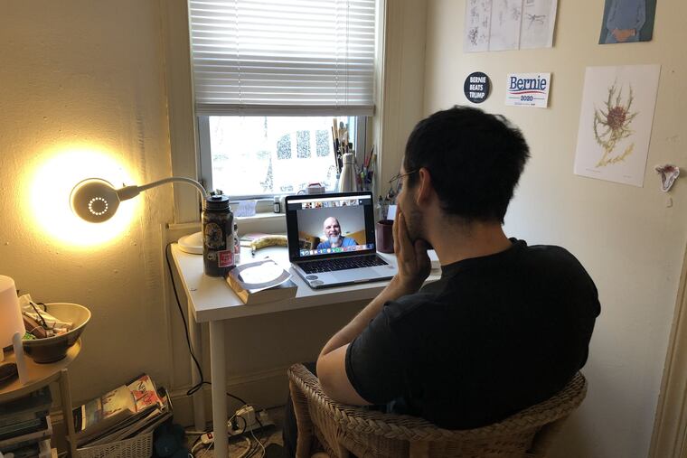 Jacob Hershman, a University of Pennsylvania senior, takes his first class online from his off-campus apartment in Philadelphia.