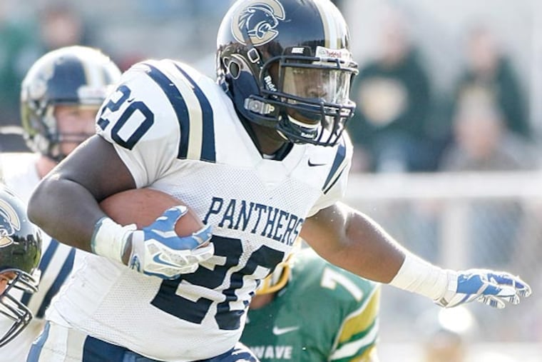 Collingswood's Anthony Rivera plows through Audubon's defensive line. (Elizabeth Robertson/Staff Photographer)