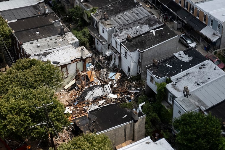 A drone view of the collapsed homes in the 1900 block of West Bristol Street on Monday, June 30, 2025 in Philadelphia. Three rowhouses collapsed early Sunday after a fire and explosion in Nicetown. One person was found dead at the scene.