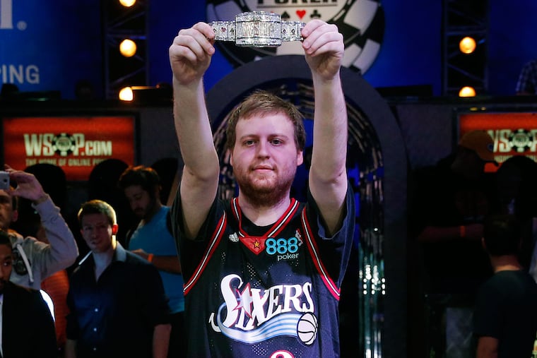 Joe McKeehen holds up the bracelet for winning the World Series of Poker Main Event on Tuesday, Nov. 10, 2015, in Las Vegas. McKeehen won more than $7 million.