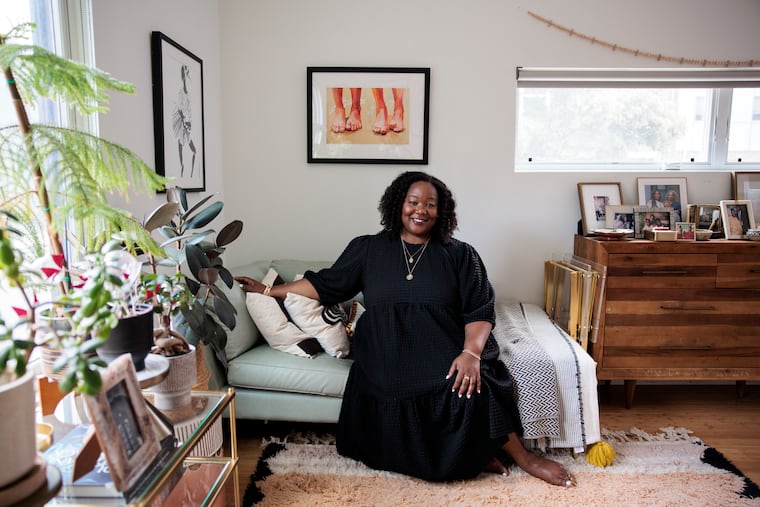Maori Karmael Holmes poses for a portrait at her Fishtown home on Tuesday, July 22, 2025 in Philadelphia.