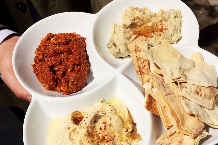 Trio of Mediterranean dips - hummus, babaganoush, and muhamara - from Apricotstone at 1040 N. American St. in Northern Liberties.