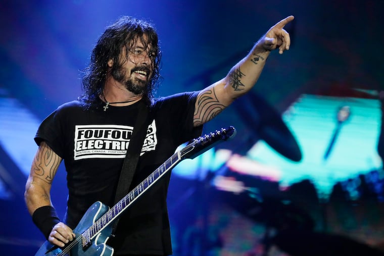 Dave Grohl of the Foo Fighters performs at the 2019 Rock in Rio music festival in Rio de Janeiro. The Foo Fighters are coming to Lincoln Financial Field on Aug. 13, 2026. (AP Photo/Leo Correa, File)