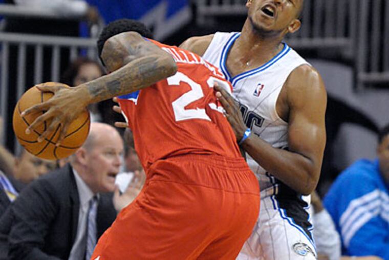 The 76ers missed nine of their first 12 shots, while Orlando made nine of its first 12. (Phelan M. Ebenhack/AP)