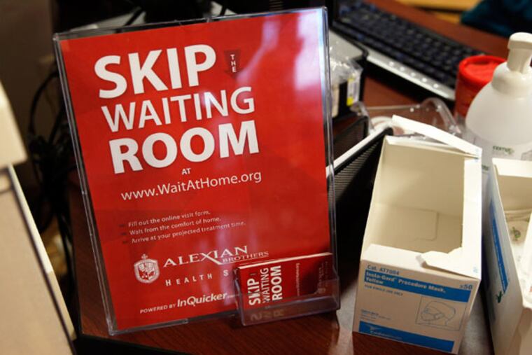 Signs let patients know they can make reservations at St. Alexius Medical Center's emergency room, January 8, 2013 in Hoffman Estates, Illinois. (Terrence Antonio James/Chicago Tribune/MCT)