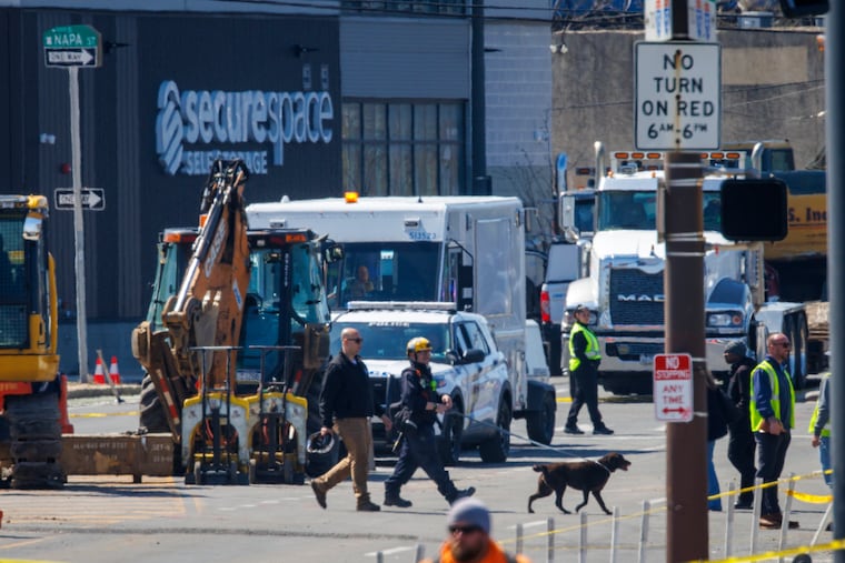 Working dog leaves the scene of partial collapse of the under construction Children’s Hospital of Philadelphia parking garage on Thursday, April 9, 2026.