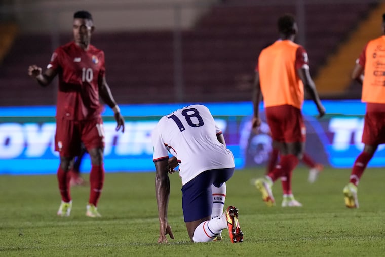 Former Union defender Mark McKenzie, center, reacts after the U.S. men's soccer team's loss in Panama on Sunday.