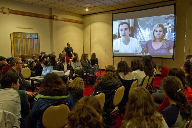 Jared Block, a sophomore at Marjory Stoneman Douglas High School, who was at the Parkland, Fla., school when the mass shooting took place Feb. 14, speaks with his mother Gayle, in a Skype session with students and their parents at Har Zion Temple in Penn Valley on Sunday, Feb. 25, 2018.
