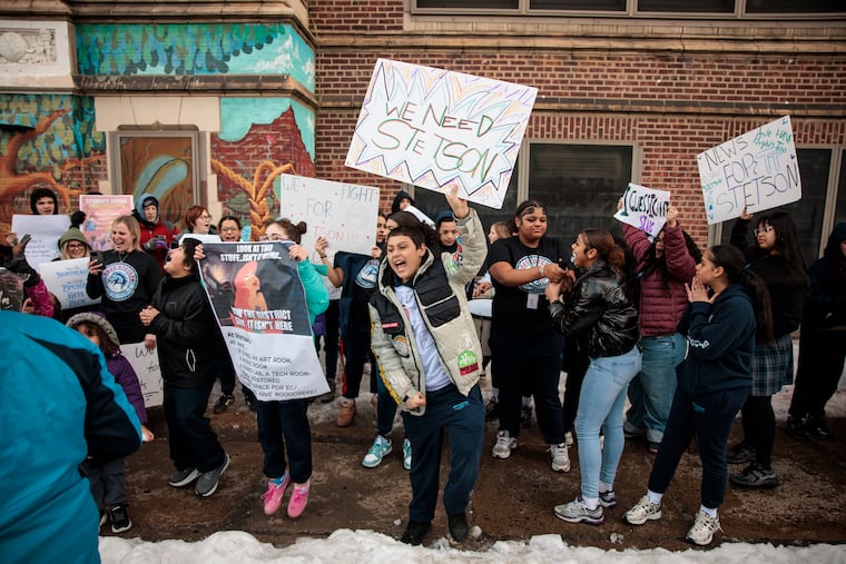Students, teachers, and supporters rally before a community meeting at John B. Stetson Middle School in Kensington last week. Stetson is one of 20 Philly public schools facing closure.