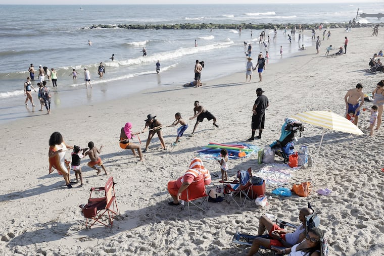 A late afternoon tug of war game on the beach in Ocean City last month.