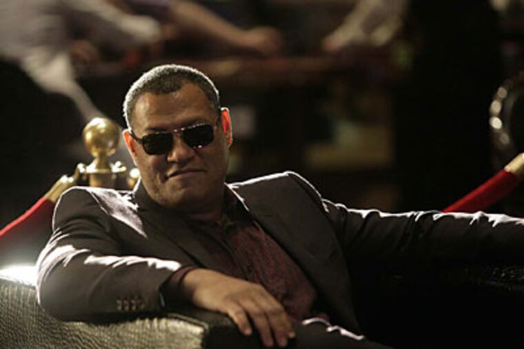 Laurence Fishburne: He's losing the suit.