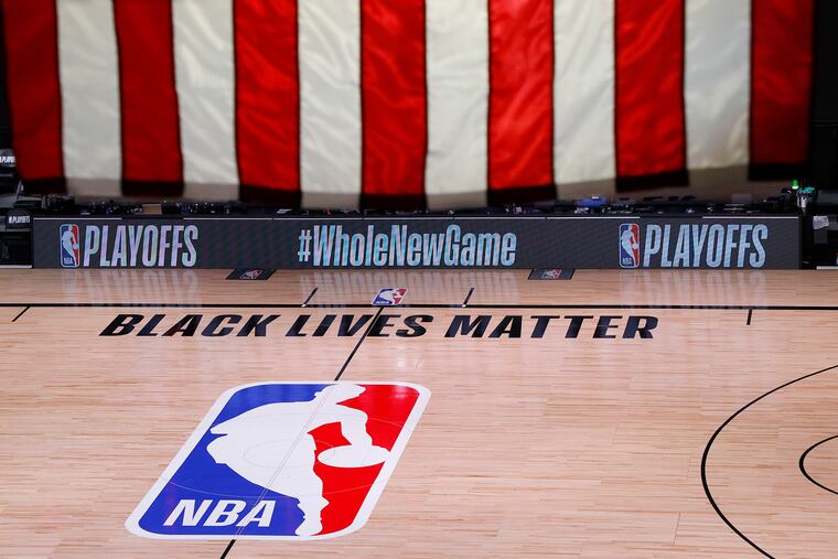 An empty court and bench are shown following the scheduled start time of Game 5 of an NBA basketball first-round playoff series Wednesday.