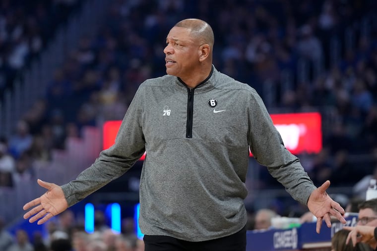 Sixers coach Doc Rivers gestures to officials during the first half against the Warriors.