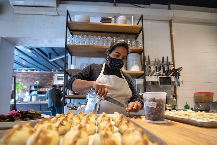 Chef Jezabel Careaga making empanadas at Jezabel's Bakery in Philadelphia last April.