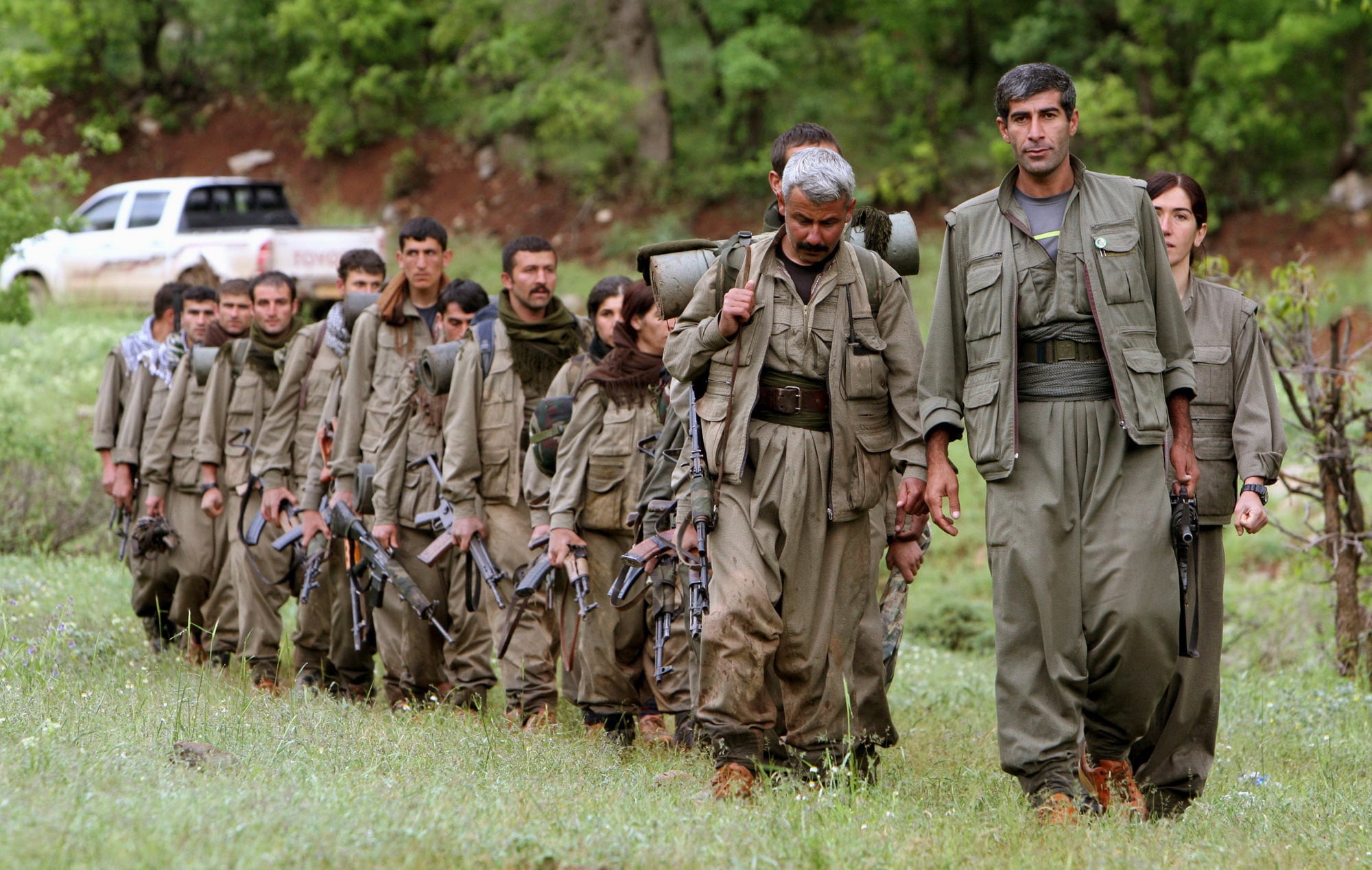 Kurdish PKK militants pull out of 4 camps in northern Iraq as part of peace process with Turkey