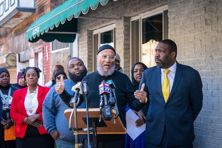 Qasim Rashad, president of the United Muslim Islamic Center, speaks during a news conference to denounce recent vandalism outside of the mosque.