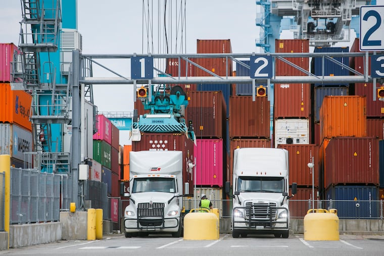 A shipping container is taken off a truck at the Port of Virginia in Norfolk, Va., Aug. 13, 2024. The cost of diesel fuel, used in farm machinery, trucks, and other heavy equipment, has surged because of the war in Iran and Ukrainian attacks on Russian refineries.