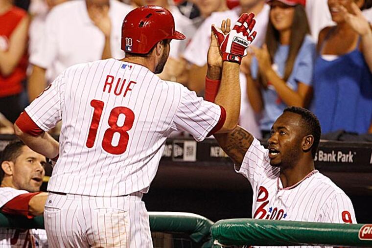 Phillies right fielder Darin Ruf celebrates his home run with left fielder Domonic Brown. (Ron Cortes/Staff Photographer)
