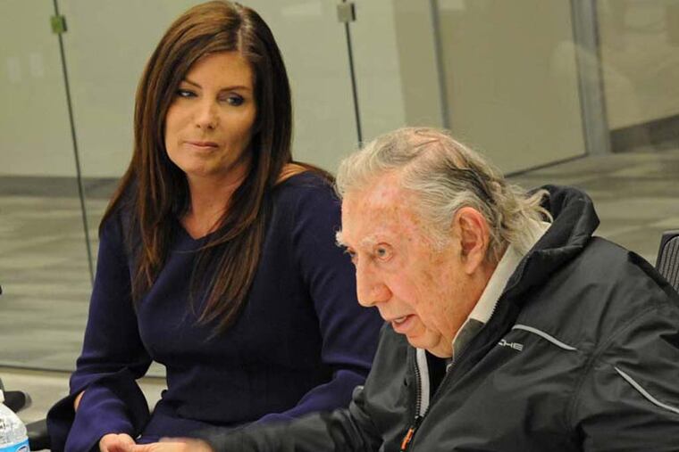 Pennsylvania Attorney General Kathleen Kane (left) listens as attorney Richard A. Sprague (right) speaks during a meeting March 20, 2014 at the offices of The Philadelphia Inquirer. ( CLEM MURRAY / Staff Photographer )