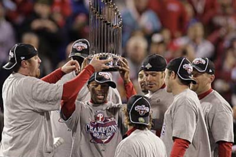 The Phillies celebrate the franchise's first World Series title since 1980 and the city's first championship since 1983. (Ron Cortes / Staff Photographer)