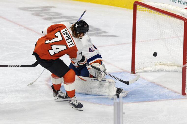 Owen Tippett scores past Islanders goalie Semyon Varlamov to put the Flyers ahead 3-1 in the second period in the final preseason game.