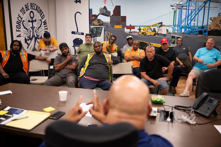 Boise Butler, president of International Longshoremen's Association Local 1291, speaks with members during a meeting at the PhilaPort Administration Building on Aug. 10 in Philadelphia.